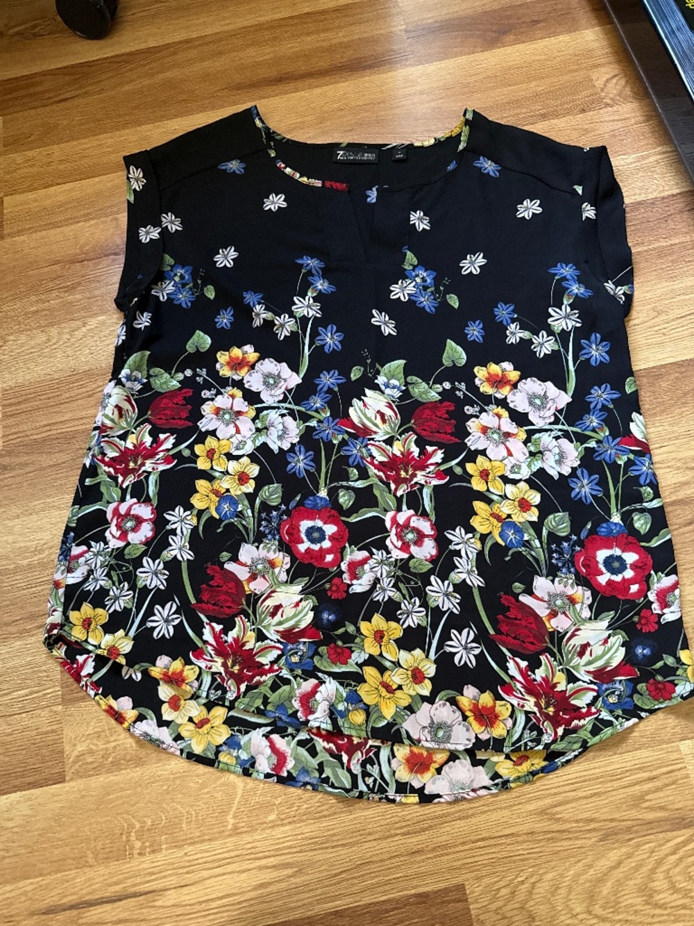 Black and flowered blouse